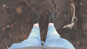 feet-standing-on-fertile-soil